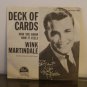 Elvis book / Wink Martindale 45 rpm.