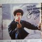 Jim Kelly autographed photograph