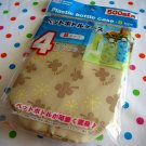 Tan clover bottle carrier bag