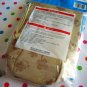 Tan clover bottle carrier bag