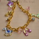Gold bracelet with enamel charms B114
