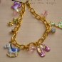 Gold bracelet with enamel charms B114