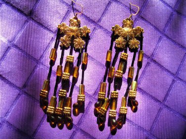 Copper star, black glass, orange glass, carnival glass beaded earrings