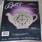 PINK AND WHITE TEAPOT CLOCK FROM BETTS - FLOWERS-CUTE