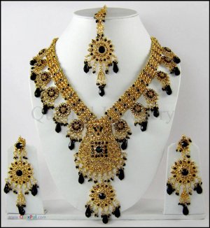 Deep Sweetie Rani Haar Studded with  CZ in Golden 423