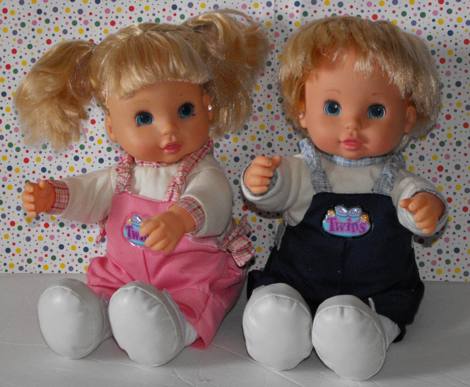 boy and girl twin dolls