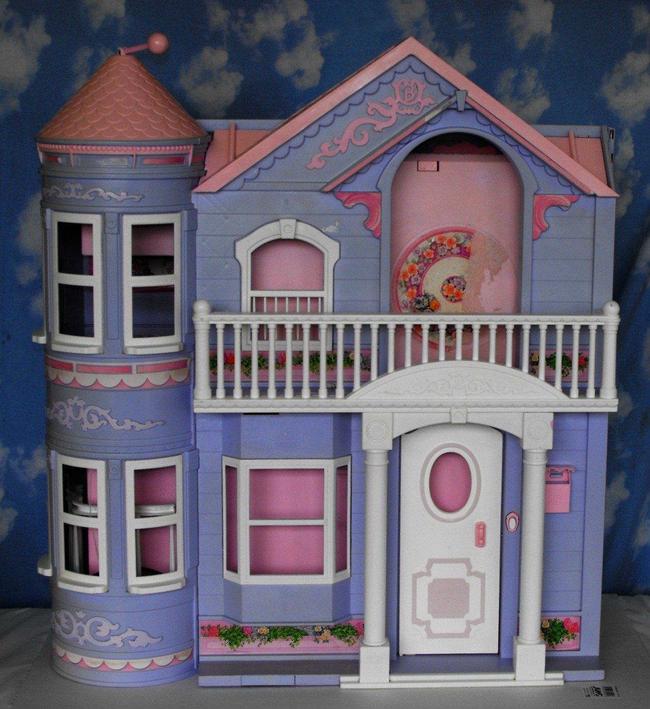 vintage barbie dream house with elevator