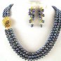 TRIPLE STRAND GREY PEARL NECKLACE WITH EMBOSSED CLASP