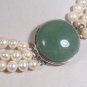 TRIPLE STRAND PEARL NECKLACE WITH JADE CLASP