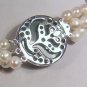 TRIPLE STRAND PEARL NECKLACE WITH JADE CLASP