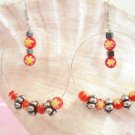 1014E  2 in. glass and antique silver bead hoop earrings