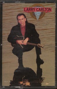 LARRY CARLTON--ON SOLID GROUND Cassette Tape