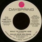 DALLAS HOLM AND PRAISE--""WHILE I'M STANDING HERE"" (3:53)/""IT'S WAR"" (3:10) 45 RPM 7"" Vinyl