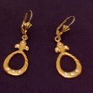 Gold Dangle Earrings.