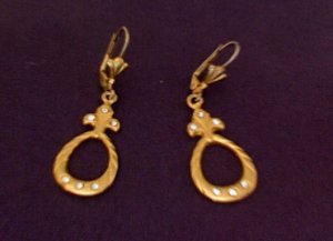Gold Dangle Earrings.