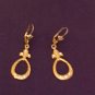 Gold Dangle Earrings.