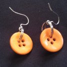 ORANGE BUTTON EARRINGS