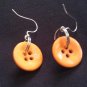 ORANGE BUTTON EARRINGS