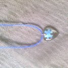 Blue puzzle piece heart