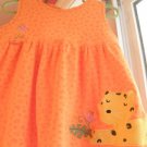 Le top play condition, Estimated  size 24 months ,  orange w/lion