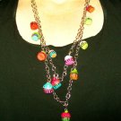 Whimsical Necklace With Multi-Colored Cupcake Charms