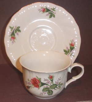 Cup and saucer with display stand