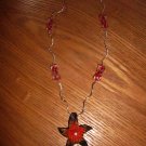 red necklace with pendant