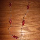 twist red necklace