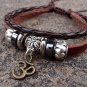 Leather bracelet with Tibetan OM drops