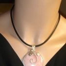 Peruvian genuine  rose quartz stone pendant 17 inches black cord.