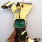 Retro goldtone & faux emerald bow brooch. Coro. 1940s.