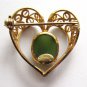 12k gold filled heart pin with a green cabochon stone