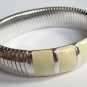 Ivory Enamel and Chrome Bracelet, by Monet. c. 1980s