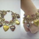 3 Lockets with Cloisonne heart charms bracelet