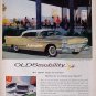 1958 Oldsmobile Rocket Ad  Ninety-Eight Holiday Coupe