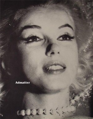 Vintage Marilyn Monroe Pinup wearing Pearl Necklace