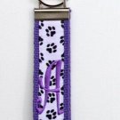Black Paw Prints on Purple Belt with Purple Initial