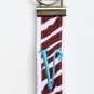 Brown Zebra on White Belt with Turquoise Initial