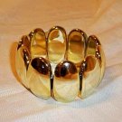 Vintage Design Oval Looking plastic Stretch Bangle Bracelet Golden Color