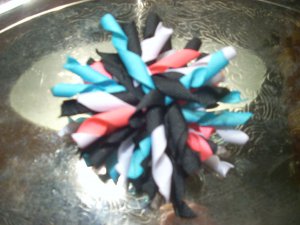 Korker bow; teal, pink, black