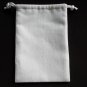 Little Parrot-cross stitch on 5"x7"white denim drawstring pouch