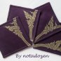 Nok Karb --a set of four 10cm.x10cm. gold color painted on violet linen coasters
