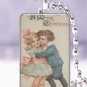 Vtg. Christmas children hug happy postcard 1 x 1.5" glass tile pendant necklace