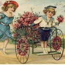 Children in Cart of Flowers New Year's Postcard VP-6607