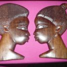 Hand Carved girl and boy plaques