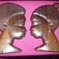 Hand Carved girl and boy plaques