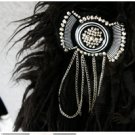 Brooch with fringe