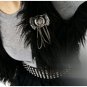 Brooch with fringe