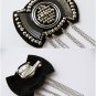Brooch with fringe
