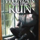 WOMAN ON THE RUN by Lisa Marie Rice